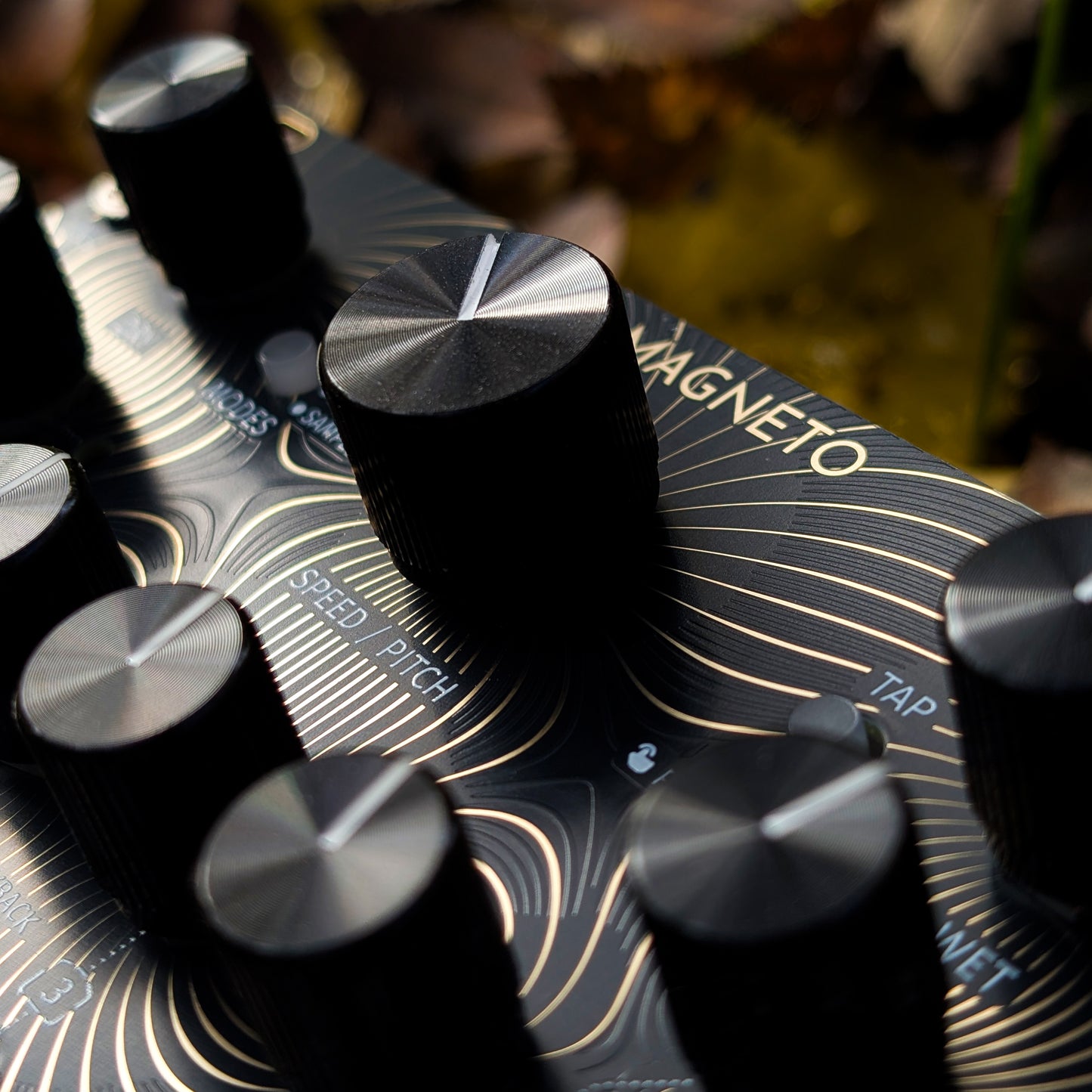 Magneto - Flux Fields - black & gold panel